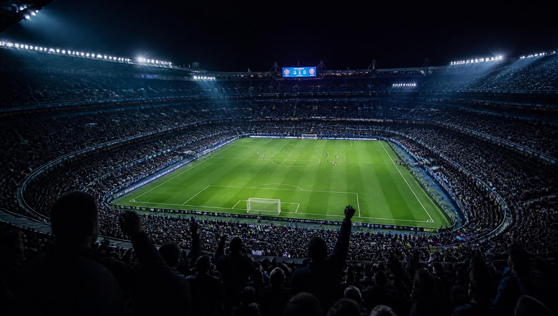 Vol voetbalstadion onder de lichtmasten